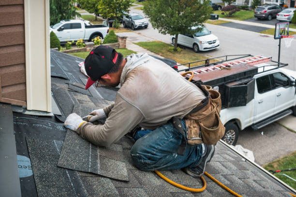 Professional Roofing technician working in Burnham, PA